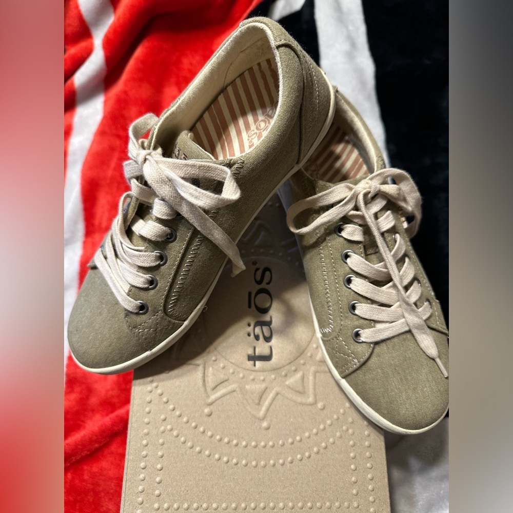 Gently used (for two weeks) army green Taos sneakers
